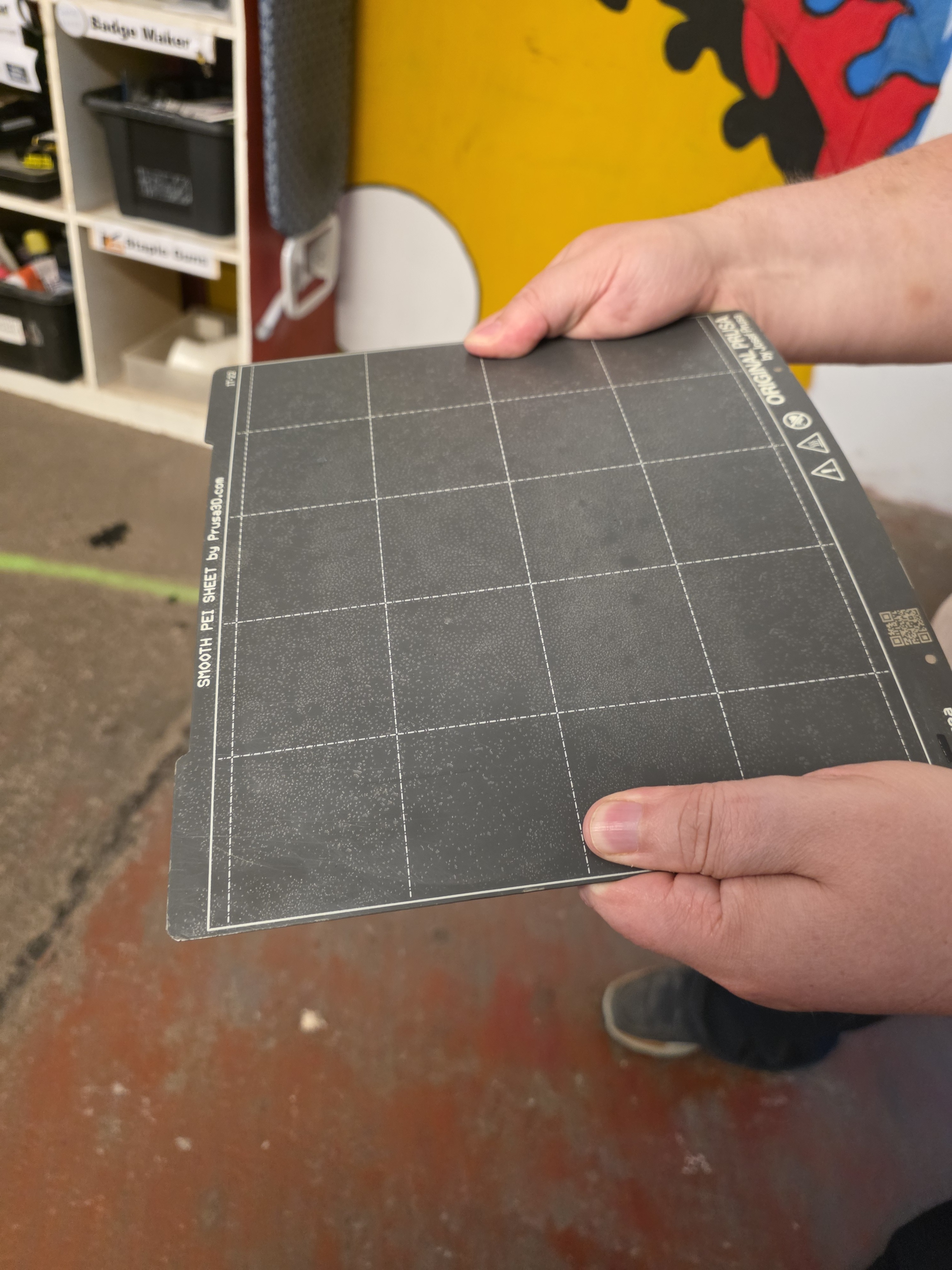 Build plate being flexed to release a print
