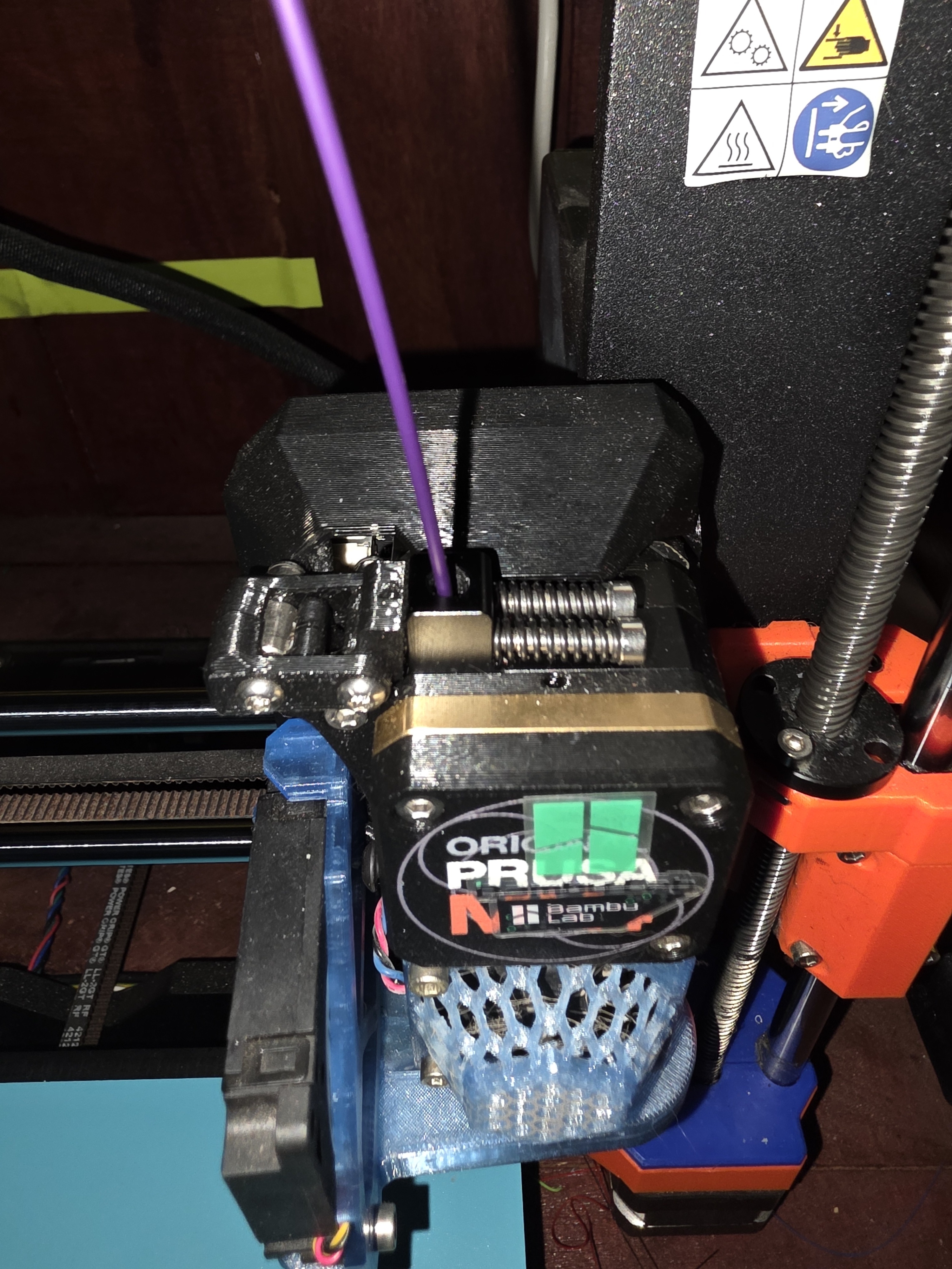 Filament entering the Prusa MK4 extruder